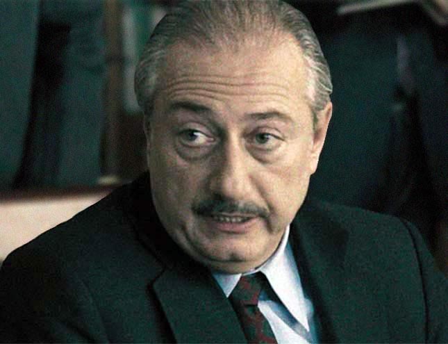 Ayhan Isik starring in 125 Years Memory as Turkish Minister of Transport Veysel Atasoy (also spelled as Ayhan Işık)